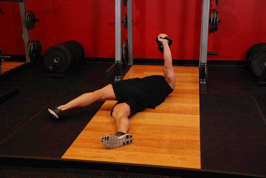 Leg-Over Floor Press — bitiş pozisyonu
